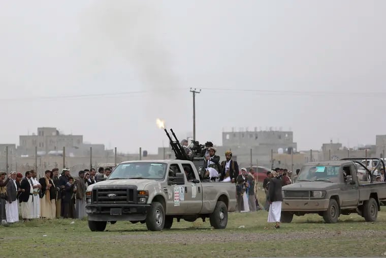 Houthi rebel fighters fire their weapons in the air as they take off to a battlefront following a gathering aimed at mobilizing more fighters for the Houthi movement, in Sanaa, Yemen, Thursday, Aug. 1, 2019. The conflict in Yemen began with the 2014 takeover of Sanaa by the Houthis, who drove out the internationally recognized government. Months later, in March 2015, a Saudi-led coalition launched its air campaign to prevent the rebels from overrunning the country's south.