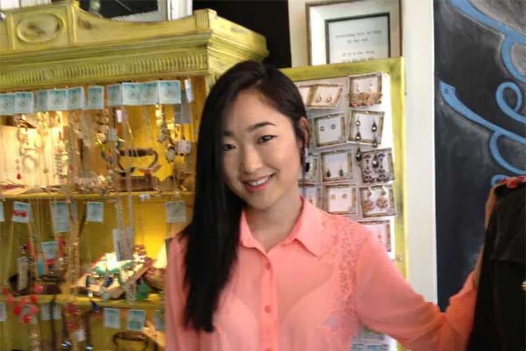 HanNa Jung added a successful fashion boutique to her parents' dry-cleaning business in University City. (Michael Hinkelman / Staff)