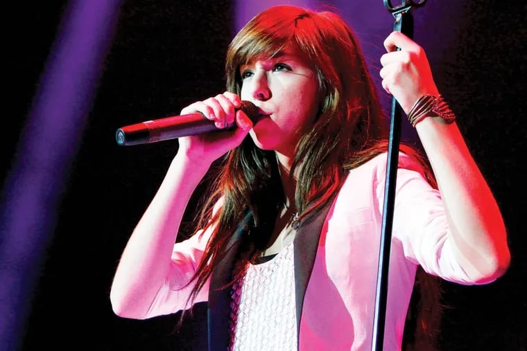 Pop artist Christina Grimmie opened for Selena Gomez on tour at Phillips Arena on Saturday, October 26, 2013, in Atlanta. (Photo by Dan Harr/Invision/AP Images)