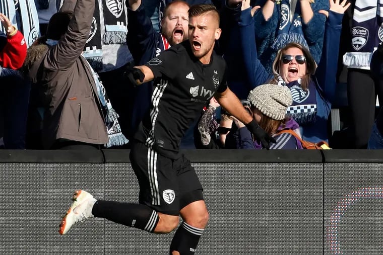 Sporting Kansas City forward Diego Rubio celebrates after scoring against Real Salt Lake during the first half.