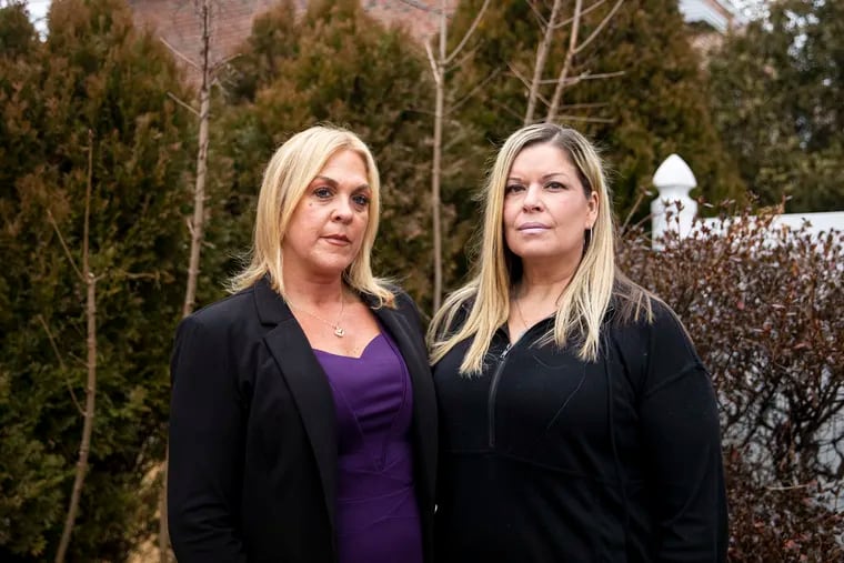Jessica Bowers, a former deputy warden in the Philadelphia Department of Prisons, and Heather Malloy, a former correctional officer, pose for a portrait in Northeast Philadelphia. They worked together for years, and both quit in 2021. “The conditions were unsafe,” Bowers said.