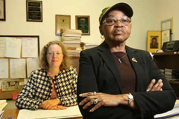 Former census worker Evelyn Houser (foreground), one of the lead plaintiffs, in the office of her lawyer, Sharon Dietrich. Houser helped take the 1990 census but was rejected for 2010. (Michael Bryant / Staff Photographer)