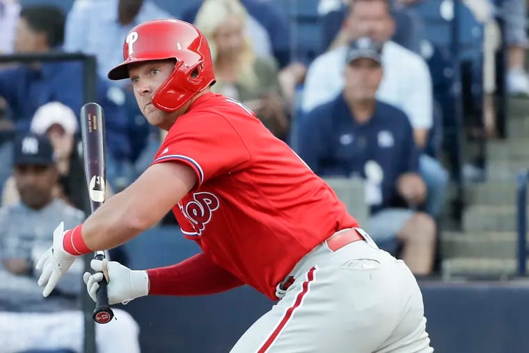 Rhys Hoskins will miss a few games this week because of soreness in his left shoulder.