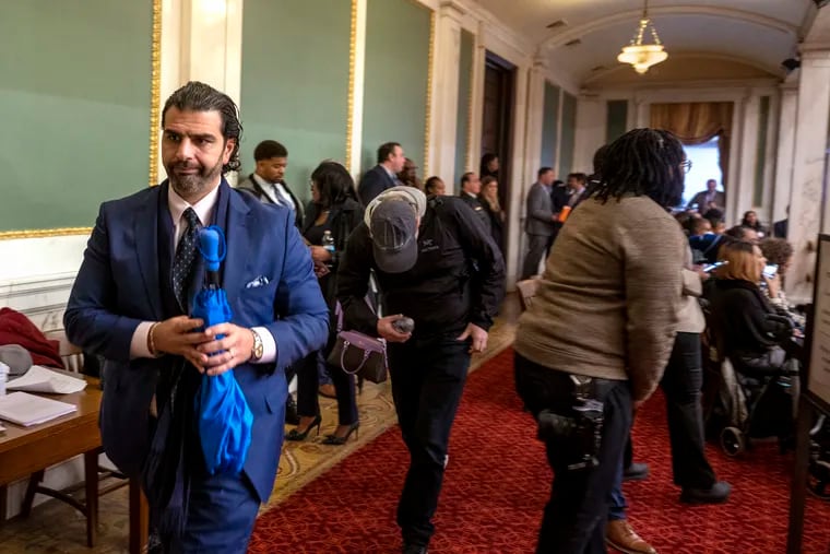 Mohamed “Mo” Rushdy leaves a Philadelphia City Council meeting on Jan. 25. The local developer has become increasingly involved in Philadelphia politics over the last several years.