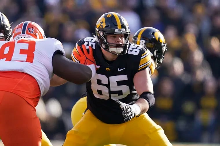 Iowa center Tyler Linderbaum carries some similarities to Jason Kelce and should be an option for the Eagles to consider for the future of the position.  


 looks to make a block during the first half of an NCAA college football game against Illinois, Nov. 20, 2021, in Iowa City, Iowa.