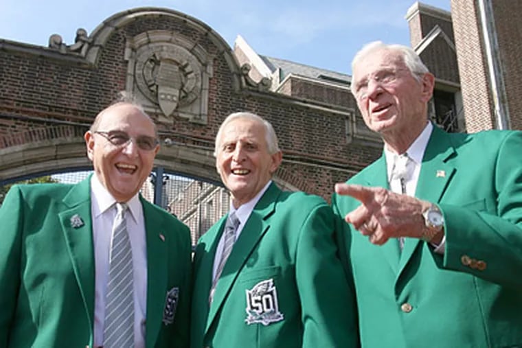 Members of the 1960 Eagles Joe Pagliei (left), Tommy McDonald, and Chuck Bednarik. (Charles Fox / Staff Photographer)