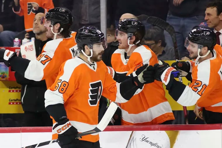 Flyers center Tanner Laczynski celebrates his first period goal with his teammates against the Colorado Avalanche on Monday, December 5, 2022 in Philadelphia.