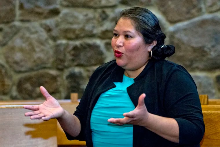 Undocumented Rosa Gutierrez Lopez of El Salvador speaks during an interview with The Associated Press after she sought sanctuary at Cedar Lane Unitarian Universalist Church in Bethesda Md., on Monday Dec. 17, 2018. Advocates say she is the first undocumented immigrant to take refuge at a Washington area house of worship. (AP Photo/Jose Luis Magana)
