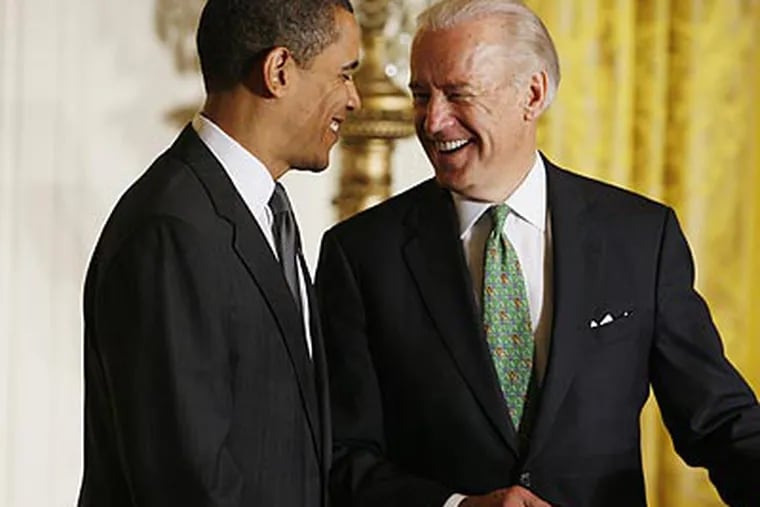 Vice President Joe Biden (right) will be in Philadelphia today to promote the government's new green jobs initiative. (Charles Dharapak/AP)