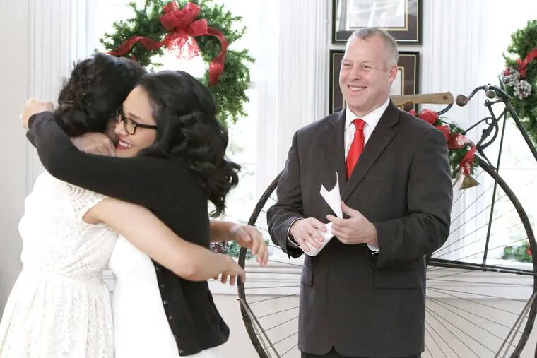 Burlington County Clerk Timothy Tyler calls weddings the fun part of his job. He married Valerie Mata (left) and Nancy Ayala at Smithville Mansion in Mount Holly.
