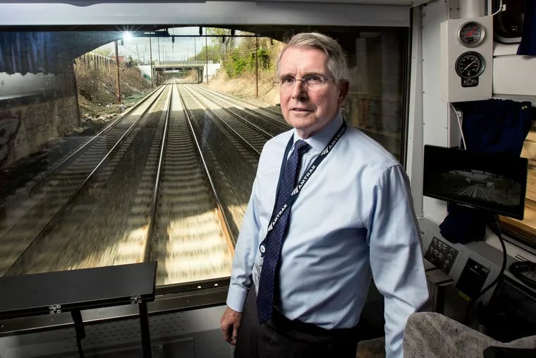 Wick Moorman, Amtrak's CEO, stands near the rear of the American View rail car, travelling between Wilmington and Trenton.