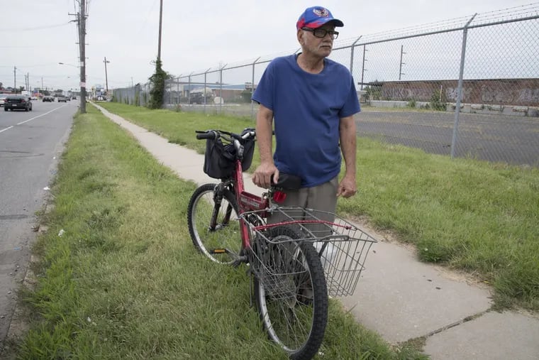 Elliot Oliveira, stands with his bike near Whitaker and Luzerne, in Philadelphia. Pa. Monday, July 30, 2018. Street safety is more of a problem in the city's poorest neighborhoods, bikers and pedestrians confront the danger of fast moving cars. JOSE F. MORENO / Staff Photographer.