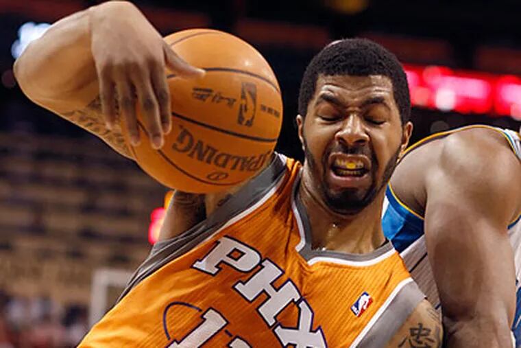 "It comes with living our dream," Markieff Morris said of being away from his brother for the first time. (Paul Connors/AP file photo)