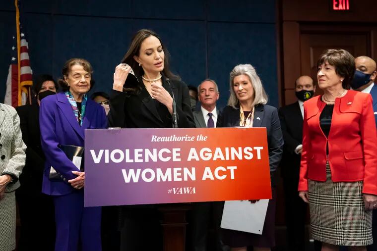 Actress and activist Angelina Jolie, center, joins, from left, Sen. Dianne Feinstein, D-Calif., Sen. Joni Ernst, R-Iowa, and Sen. Susan Collins, R-Maine, at a news conference to announce a bipartisan update to the Violence Against Women Act, at the Capitol in Washington, Wednesday, Feb. 9, 2022.