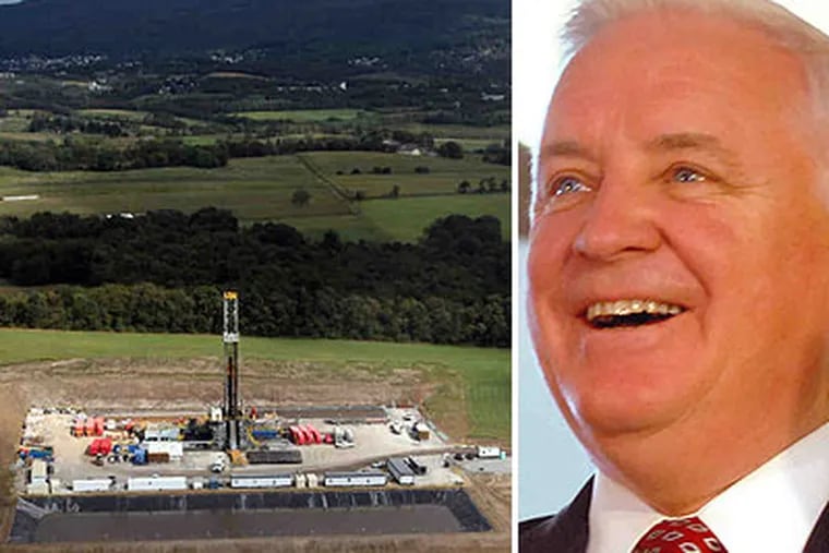A Marcellus Shale gas drilling site near Latrobe, Pa. Gov. Tom Corbett (right) has said he is open to a fee to aid host communities. (Laurence Kesterson / Staff Photographer)