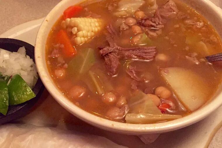 Caldo de res beef stew with soft tortillas and all the fixings at Loco Pez in Fishtown.