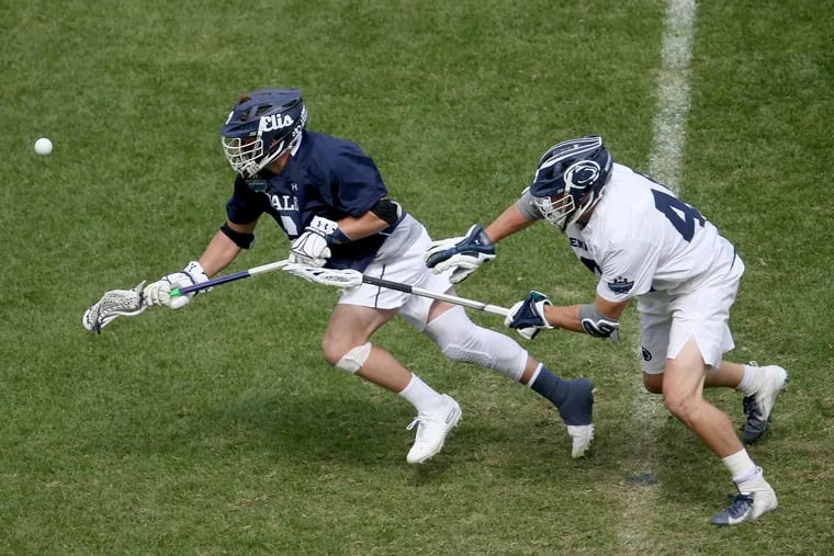 Yale's TD Ierlan (6) wins a face off against Penn State's Gerard Arceri (40) during their NCAA men's Division I lacrosse semifinal game at Lincoln Financial Field in South Philadelphia on Saturday, May 25, 2019.