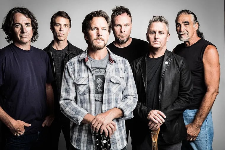 Grunge-rock great Pearl Jam , led by singer Eddie Vedder (center), started a two-night run at the Wells Fargo Center on Thursday night.