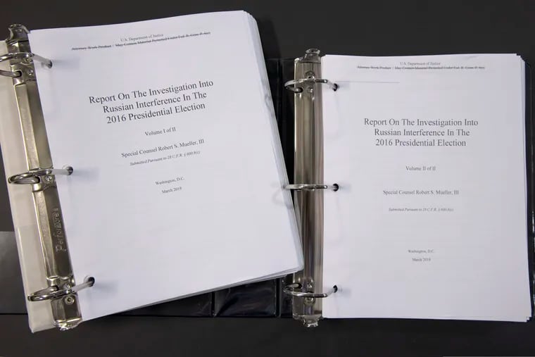 Special counsel Robert Mueller's redacted report on the investigation into Russian interference in the 2016 presidential election is photographed Thursday, April 18, 2019, in Washington. The report contained two volumes.