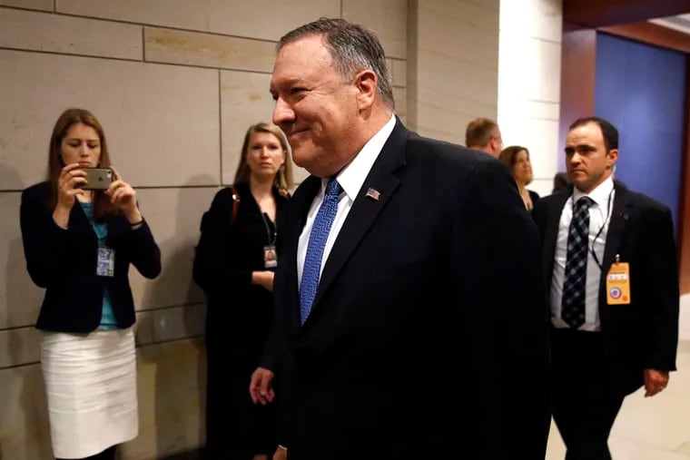 Secretary of State Mike Pompeo arrives at a classified briefing for members of Congress on Iran, Tuesday, May 21, 2019, on Capitol Hill in Washington.