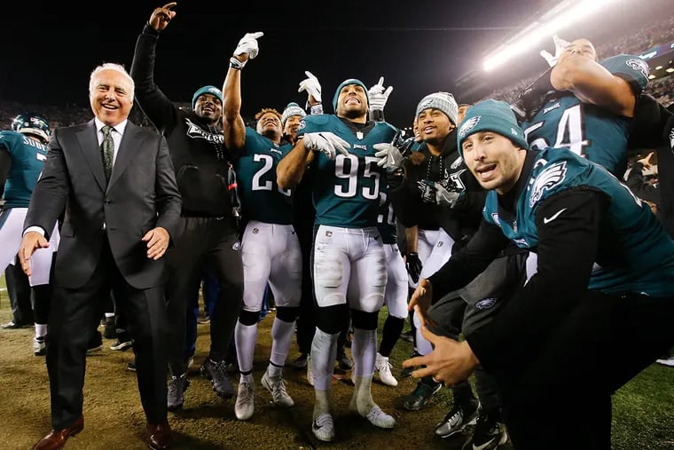 Eagles owner Jeffery Lurie dancing with the members of his team after they beat the Minnesota Vikings in the NFC championship game.