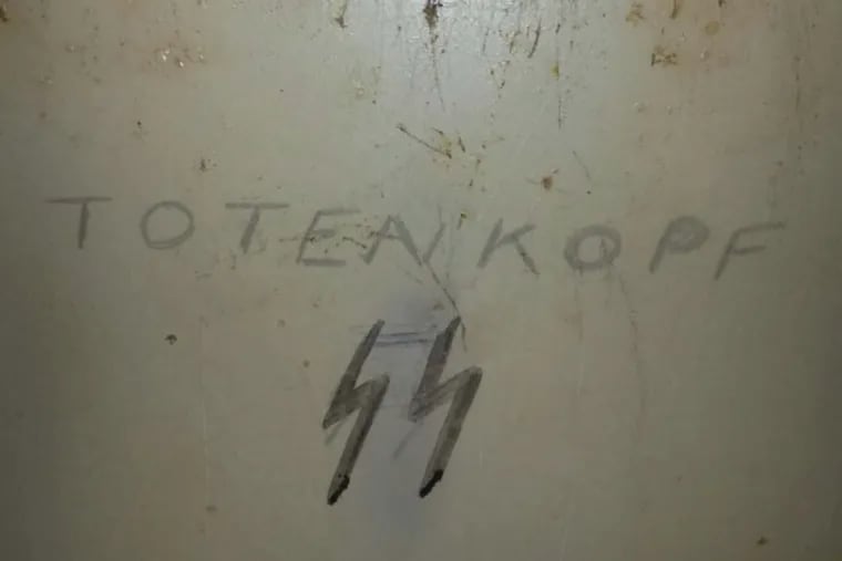 Federal lawsuit filed Monday night alleges anti-Semitic acts committed by more than 10 Philly cops in a Fairmount district led by a woman corporal. In this evidentiary photo, "SS Totenkopf," Nazi battalion that ran the death camps, was carved onto a locker beside the locker belonging to a Jewish cop.