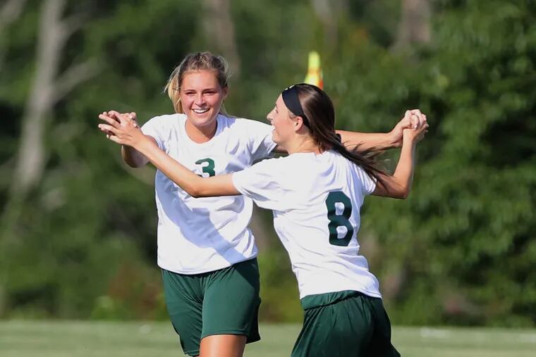 Elizabeth Bonomo, left, and Sydney Wurst of Clearview celebrate after Wurst's goal in Clearview's 4-2 win against Kingsway on Wednesday.