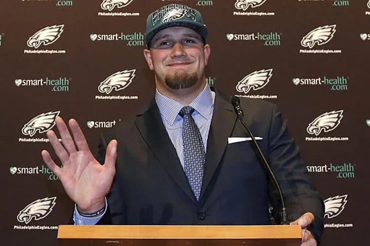 The Eagles took offensive tackle Lane Johnson with the fourth overall pick in the 2013 NFL Draft. (Matt Slocum/AP)
