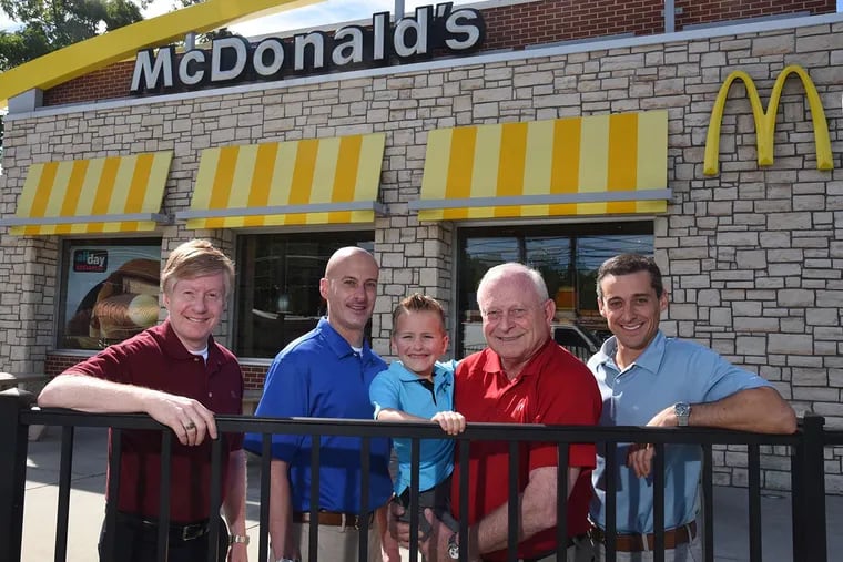 Three generations of Dukarts at their Morrisville McDonald's: ( From left) Alan Dukart, 59; Michael, 41, Michael's son Eli, 6; Les, 69; and Joel, 38.