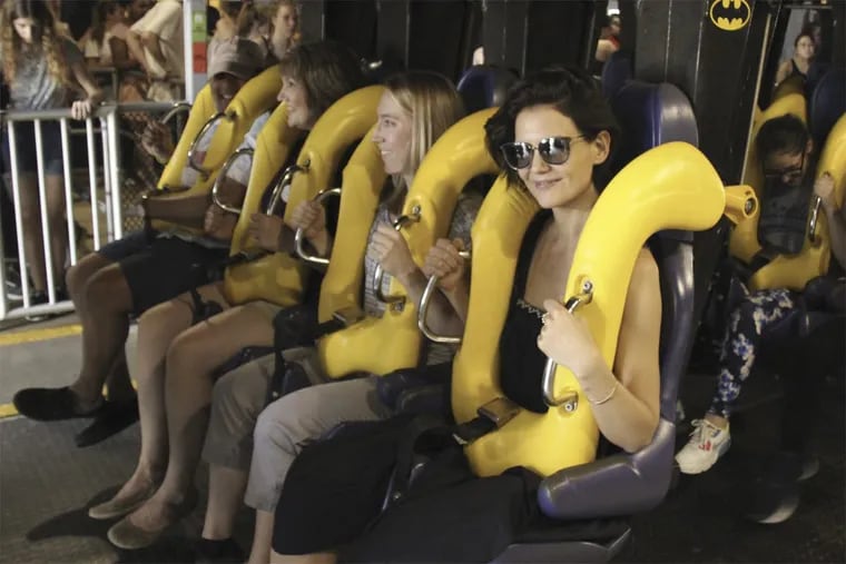 Actress Katie Holmes rides Batman: The Ride at Six Flags Great Adventure in Jackson, New Jersey on Saturday, April 14, 2018.