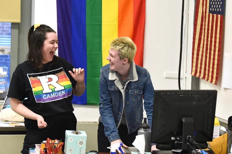Haddon Heights High School sophomores Olivia Loesch (left) and Lola Rossi (right) meet with the Gay Straight Alliance after school last week. Hadon Heights is one of 12 N.J. districts testing a pilot curriculum for teaching the historical contributions of the disabled and lesbian, gay, bisexual, and transgender people.