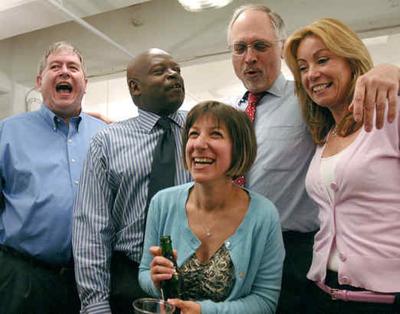 From left: Daily News managing editor Pat McLoone, editor Michael Days, reporter Wendy Ruderman, city editor Gar Joseph and reporter Barbara Laker bask in the glory of winning the 2010 Pulitzer Prize for investigative reporting.