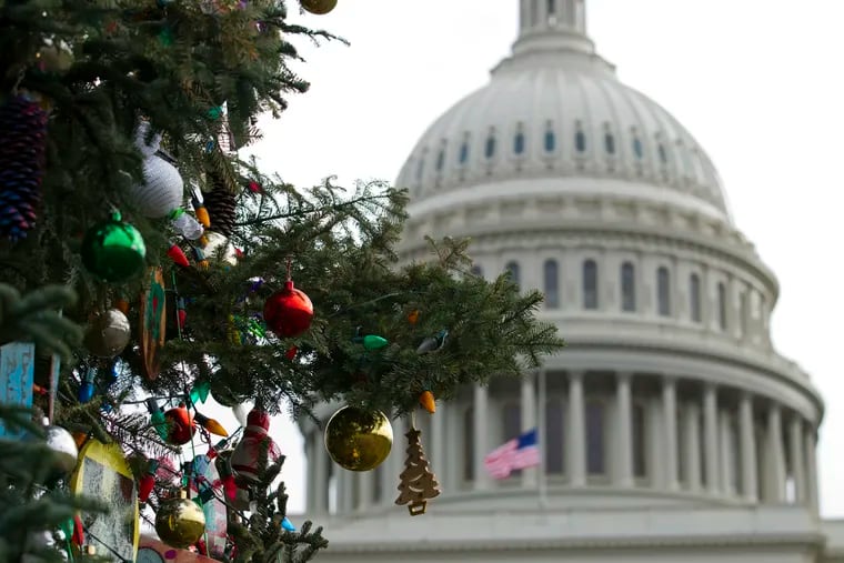 The Capitol Christmas tree decorations are seen outside of The U.S. Capitol in Washington. (AP Photo/Jose Luis Magana)