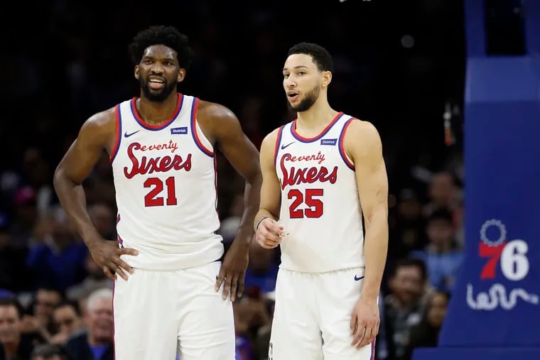 Sixers Ben Simmons (right) and Joel Embiid have been working on their pick-and-roll pairing during training camp.