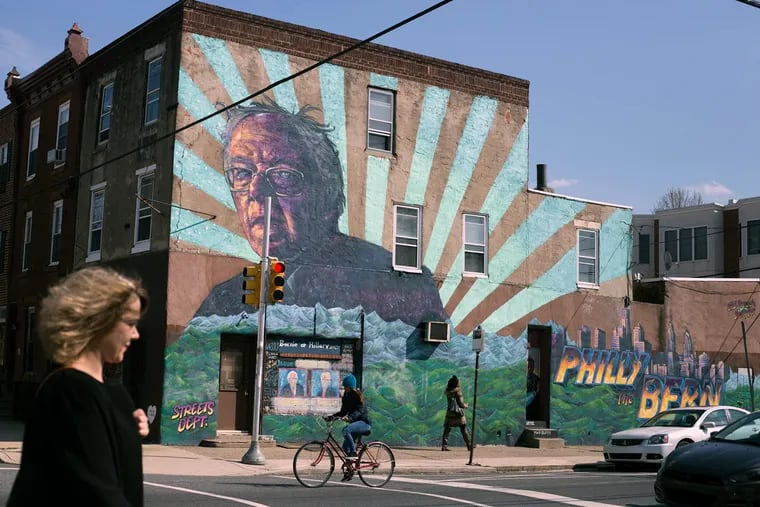 A mural of Democratic presidential candidate Bernie Sanders at 22nd and Catharine Streets. Two artists took five days to finish the painting, funded by online donations.