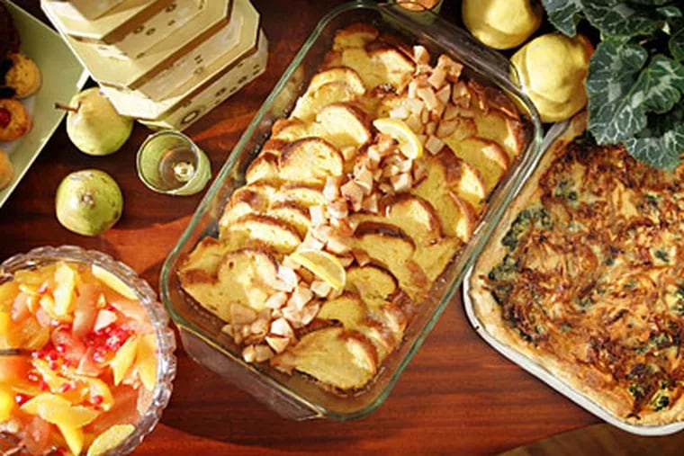 A breakfast of citrus salad with pomegranates, buttermilk bread pudding with maple roasted pears, and caramalized onion tart with spinach and cheese. ( David Swanson / Staff Photographer )