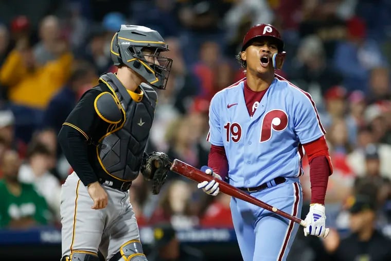 Phillies Cristian Pache yells after striking out swinging to end the game against Pirates catcher Jason Delay.