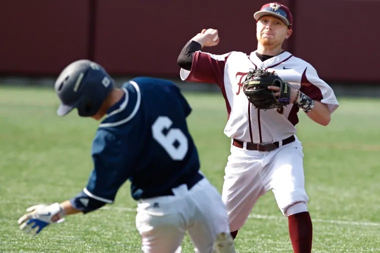 Haverford's second baseman #5, Kevin McGowan tags second for the put out on Malvern Prep's #6, Doug Hook but was not able to turn the double play in the 5th inning.  Malvern Prep beat at the Haverford School in baseball 7-6. 04/21/2015 ( Michael Bryant / Staff Photographer )