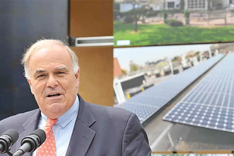 Gov. Rendell opens the door to applications for Sunshine solar-energy rebates of up to 35 percent during a ceremony yesterday at the Roxborough home of Charlie Bushka and Lynette Rundgren. (Sharon Gekoski / Staff Photographer)