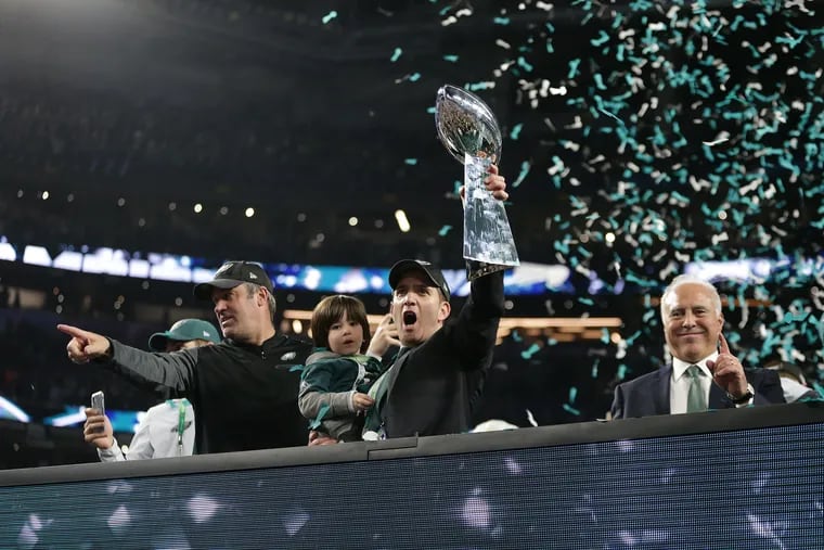 The winning Eagles team — GM Howie Roseman, coach Doug Pederson, and owner Jeffrey Lurie — at their greatest moment.