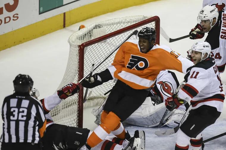 Wayne Simmonds celebrates what he thought was the tying goal, but it was disallowed.