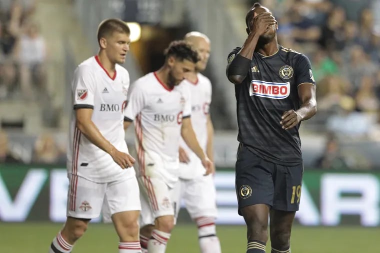Union forward Cory Burke reacts to over kicking the net in the second half of the Union's loss to Toronto FC on Friday. 