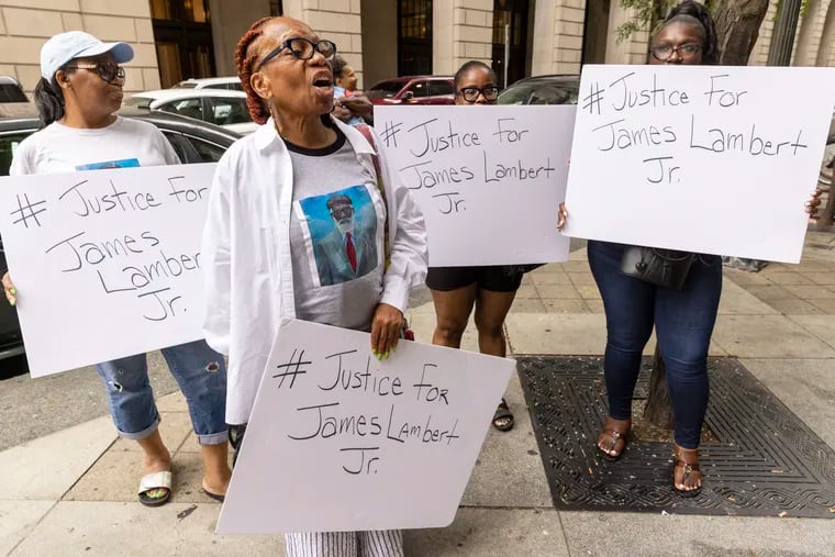 Tania Stephens, niece of James Lambert Jr., leads protest with family members Rochelle Stephens, Ayisha Stephens and Erica Williams. They gathered outside District Attorney Larry Krasner's office Tuesday to demand that more people be charged in the third-degree murder case of their uncle.