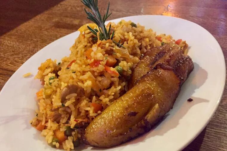 Colombian-style arroz con pollo from  Tierra Colombiana, on North Fifth Street in Philadelphia. The restaurant’s owner has agreed to pay some employees back wages and damages.