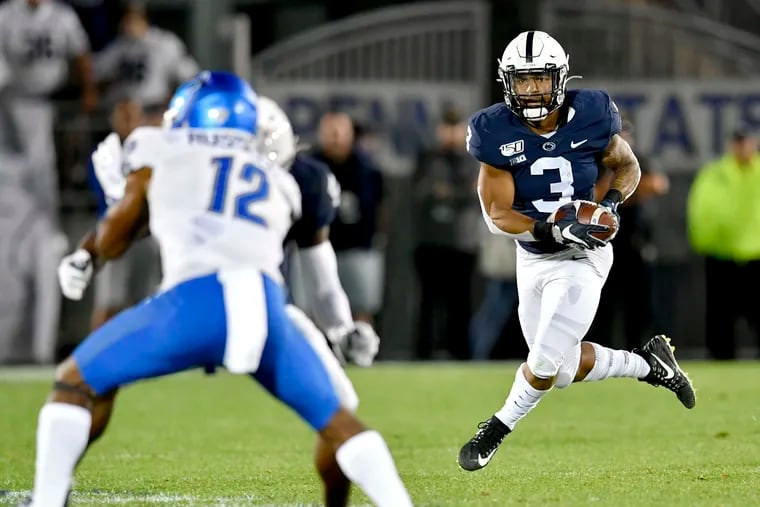 Penn State running back Ricky Slade tries to cut down the field with the ball during the game against Buffalo on Sept. 7, 2019.
