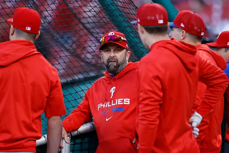 Phillies hitting coach Kevin Long, during batting practice in the wild-card round against the Cardinals, had an impact on multiple players.