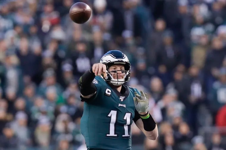 Eagles quarterback Carson Wentz throws the football during the first-quarter against the Dallas Cowboys on Sunday, December 22, 2019 in Philadelphia.
