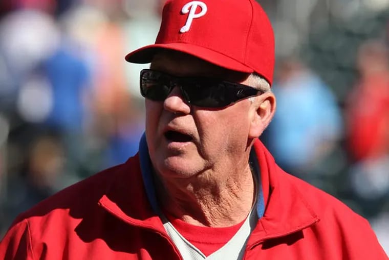 Charlie Manuel leaves the field after the Phillies beat the New York Mets 9-4 in a baseball game in New York on Saturday, April 27, 2013. (Peter Morgan/AP)