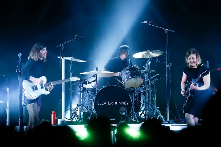 Sleater-Kinney members (from left-right): guitarist/vocalist Carrie Brownstein, guitarist/vocalist Corin Tucker and drummer Angie Boylan perform at the Fillmore Philadelphia on Sunday, October 27, 2019.