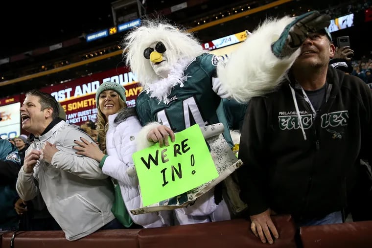 Eagles fans cheer after the No. 6 seed became official.
